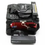 Batteria per giuntatrice a fusione con scanalatura a V in fibra ottica