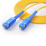 Close-up of SC connectors on single mode simplex fiber patch cable