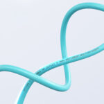 SC UPC to FC UPC Duplex Fiber Optic Patch Cable bent to show flexibility