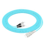 SC UPC to FC UPC Duplex Fiber Optic Patch Cable coiled in a circle