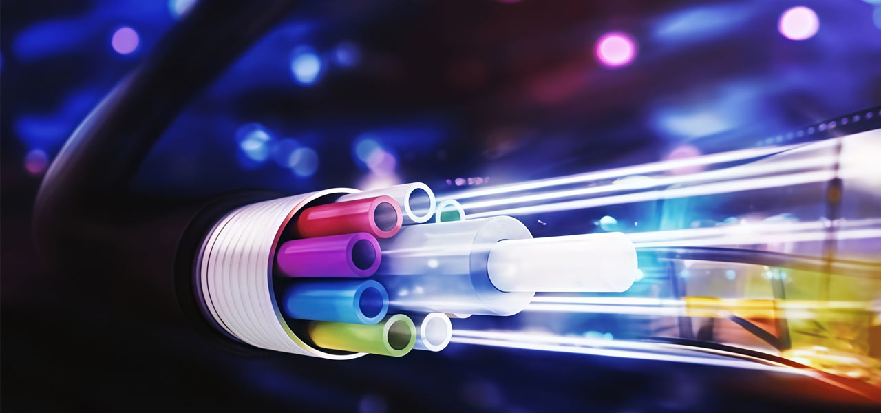 Fiber optic cables connecting network equipment in a data center